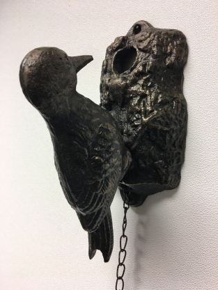 Beautiful distinct door knocker, woodpecker in bronze color, metal.